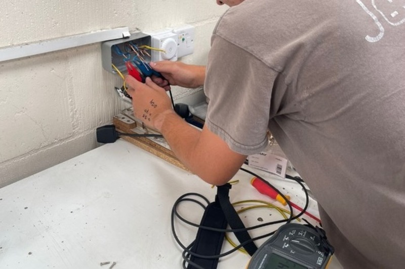 A Jack Jones Electrician carrying out electrical repair