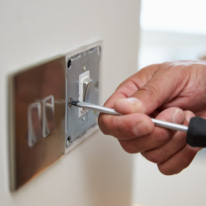 electrician repairing socket